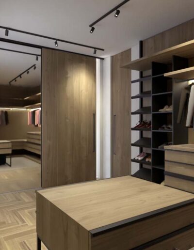 design e decoração de closet de uma suite com espelhos e iluminação no mobiliário por medida