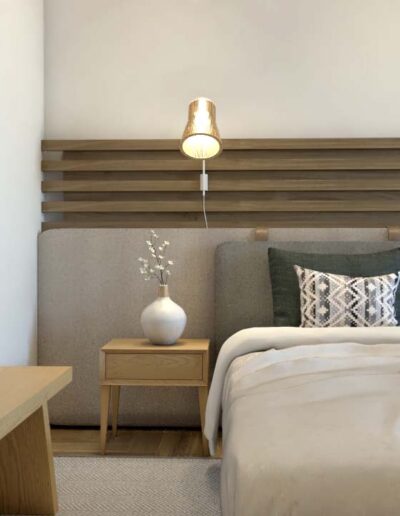 design e decoração de quarto de uma habitação moderna com camas e cabeceira em madeira personalizada e mobiliário por medida